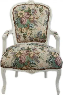 A white armchair with a floral pattern.