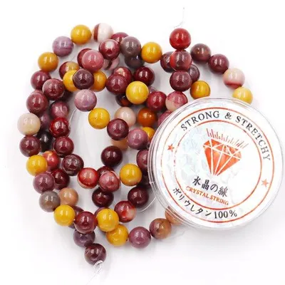 Immagine prodotto di Bracciale con pietre energetiche da 8 mm, 96 pezzi con cordino
