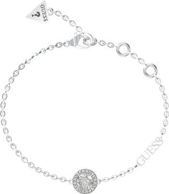 A silver Guess bracelet with a central crystal.