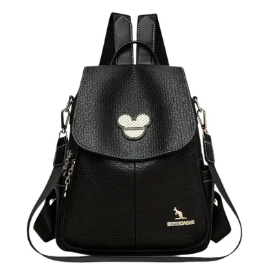A black leather backpack with a Mickey Mouse-like emblem on the front flap and a kangaroo logo on the lower front.