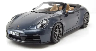 Produktbild von NOREV 1:18 Porsche 911 (992) Carrera Cabriolet (2025) - Yachting-blue met. 18718