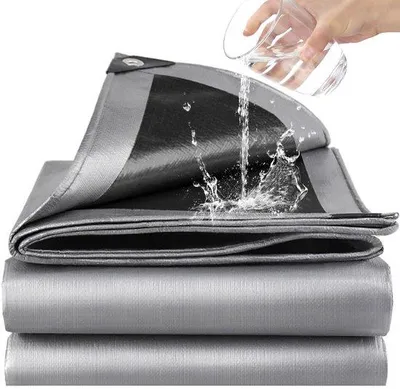 Imagen del producto de Unyqoos® Lona protectora de PE, 2 x 3 metros – resistente al agua y al desgarro, 180 g/m², resistente a los rayos UV y a las heladas, color plateado-, ojales de 11 mm cada 50 cm, incluye cuerda de sujeción, ideal para jardín y camping