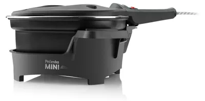 A black electric roaster with a silver trim and a black handle, shown from a side angle on a white background.