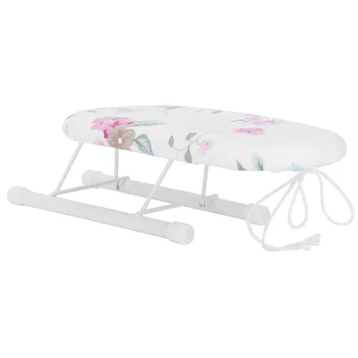 A small ironing board with a floral pattern.