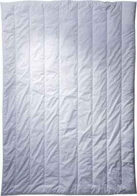 A white duvet is laid flat on a white background, showing its quilted texture and vertical stitching.