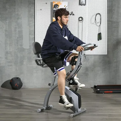 Image de Vélo d'appartement pliable avec frein magnétique, supportant jusqu'à 120 kg. X-Bike, vélo d'entraînement pliable avec dossier, écran LCD et sangles de résistance pour l'entraînement des bras, couleur noir et gris