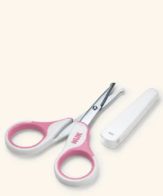 A pair of baby scissors and a protective case on a plain background.