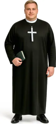A man dressed in a priest costume holding a small book.