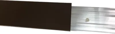 A close-up view of a brown trim piece partially covering a silver metal track.