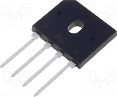 A close-up, angled view of a black electronic component with four white pins extending from the bottom.