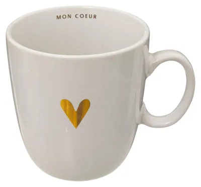 A white ceramic mug with a gold heart design and text inside.