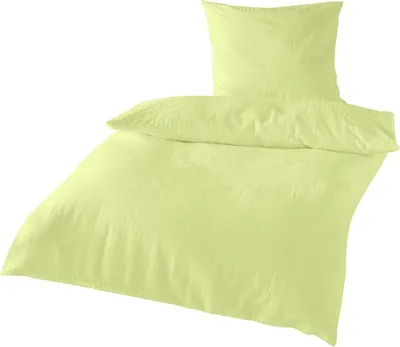 Produktbild von Traumschlaf Uni Seersucker Bettwäsche 200x200 cm + 2x 80x80 cm limone