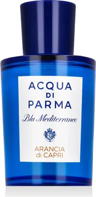 A product shot of a blue glass perfume bottle with a white label.