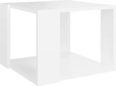 A white cube-shaped side table or storage unit.