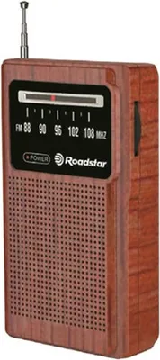 A portable radio with a wood-grain finish.