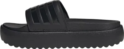 A side view of a black Adidas platform slide sandal.