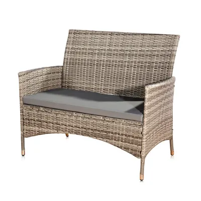 A gray rattan garden bench with a dark gray cushion, shown on a white background.