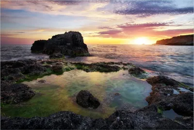Produktbild von Wallario Poster - Felsige Küste bei Sonnenuntergang, Kunstdruck Größe: 61 x 91,50 cm