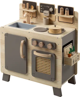 A wooden toy kitchen with accessories.