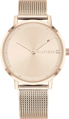 A close-up studio shot of a rose gold Tommy Hilfiger women's watch.