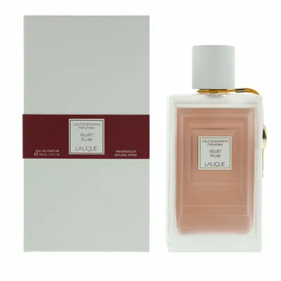A perfume bottle and its packaging are displayed against a white background.
