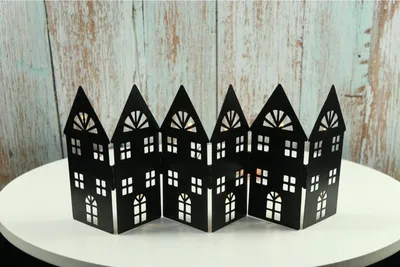Produktbild von Metallhaus faltbar mit 12 warmweißen LEDs und Timer ca. 73x14cm im 12er Set | Dekoratives LED-Haus für Weihnachten Winter Fensterbank