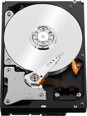 An open hard disk drive showing its internal components.