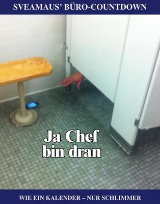 A hand reaching out from under a stall door in a public restroom.