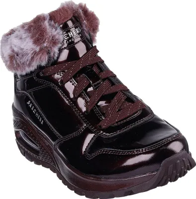 A single brown Skechers boot with faux fur trim is shown against a white background.