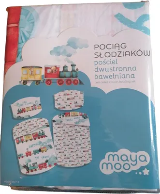 The image shows the packaging of a baby bedding set with a train theme.