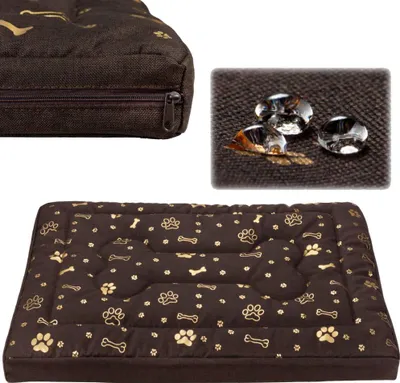 A collage of images showing a dog bed with a paw print and bone pattern, a close-up of the fabric demonstrating water resistance, and a close-up of the zipper.