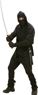 A person dressed in a ninja costume holding a sword.