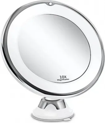 A close-up, studio shot of a white and silver magnifying makeup mirror with a suction cup base.