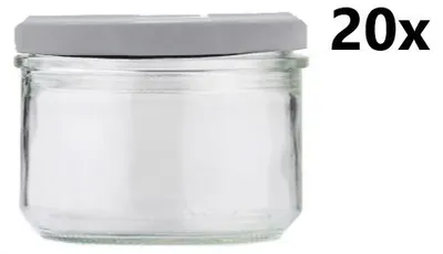 A clear glass jar with a gray lid, with the text '20x' in the upper right corner.