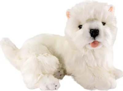 A white plush toy dog lying down.