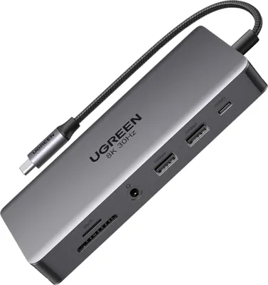 A gray USB-C hub with various ports and a connected cable, shown against a white background.