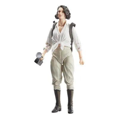 A full-body shot of a female action figure holding a camera and wearing a backpack.