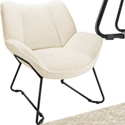 A cream-colored armchair with a bouclé fabric and black metal legs, presented on a white background.