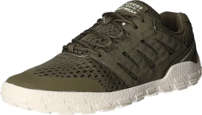 A single green sneaker is shown from a side-angle on a white background.