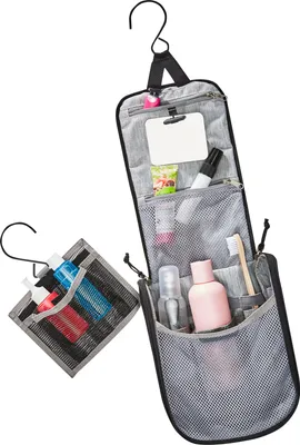 A hanging toiletry bag with various travel-sized toiletries inside, shown against a white background.