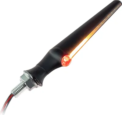 A black motorcycle turn signal light with an orange LED light illuminated.