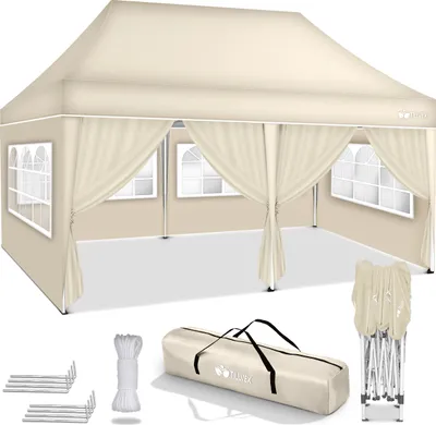 A beige pop-up canopy tent with side walls and windows, along with its accessories, is displayed on a white background.