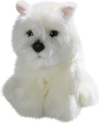 A stuffed toy dog sitting and facing forward.