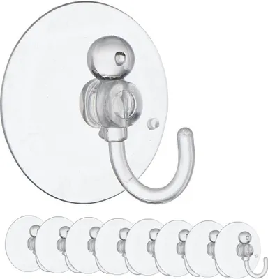 A set of clear plastic suction cup hooks against a white background.