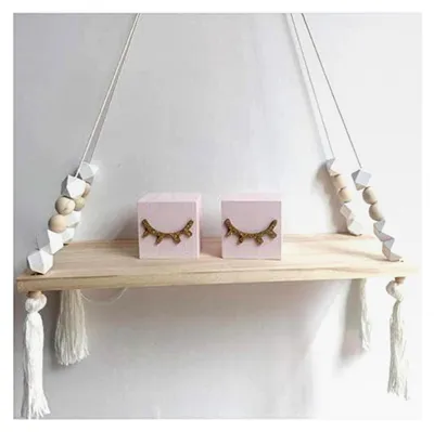 Produktbild von Wandregal für das Kinderzimmer mit Quasten und Holzperlen, Hängeregal für Raumaufbewahrung, Schweberegal aus Holz in Weiß