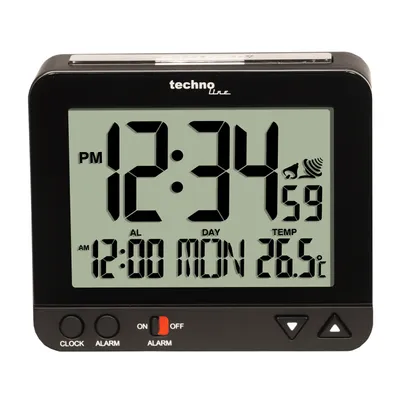 A black digital alarm clock displaying the time, date, and temperature.