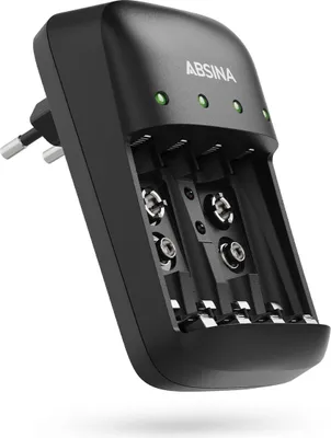 A black battery charger with four slots for batteries.
