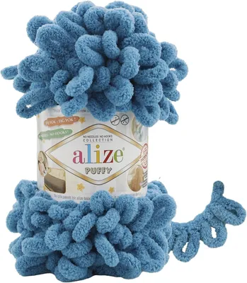 A ball of blue yarn with loops, wrapped around a cylindrical product label.