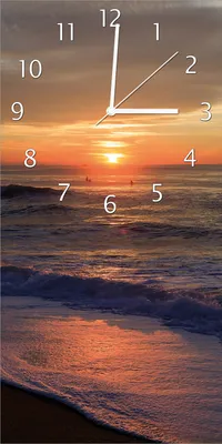 Produktbild von Wallario Design Wanduhr bedruckt, Größe 30 x 60 cm, Motiv: Sonne über dem Meer