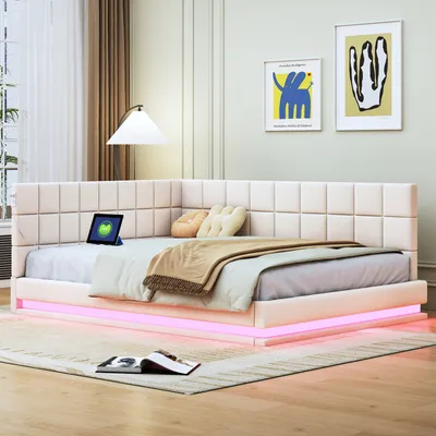 A modern bedroom with a beige upholstered corner bed featuring LED lighting.
